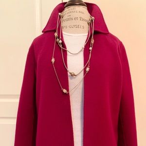 Elegant wool jacket with collar by Dana Buckman.